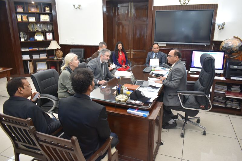 A group of people sitting in an office