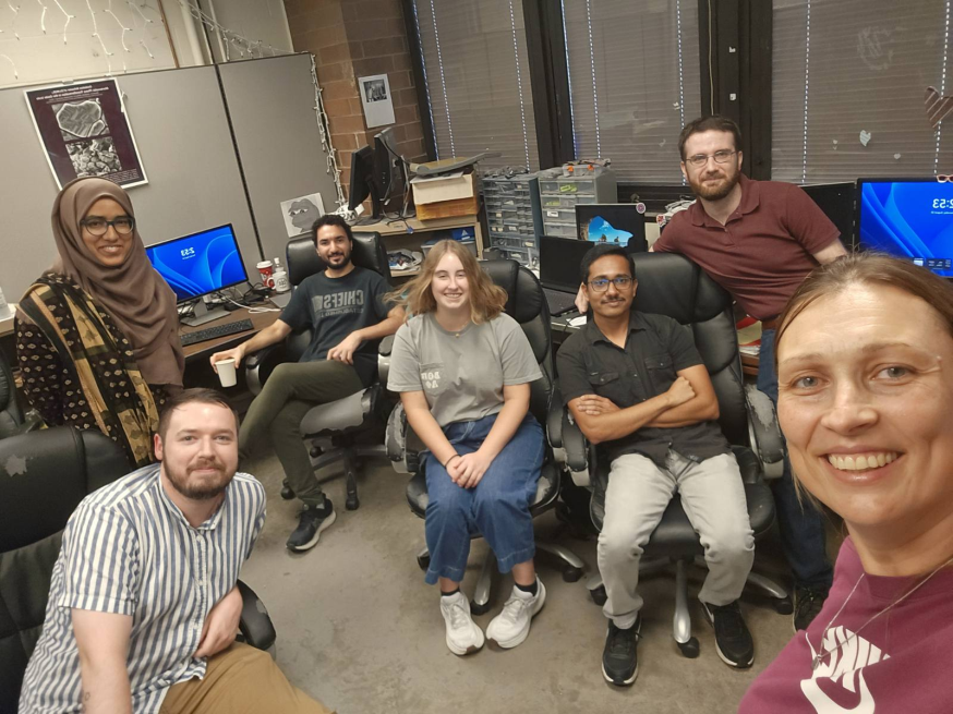 researchers at the lab taking a selfie